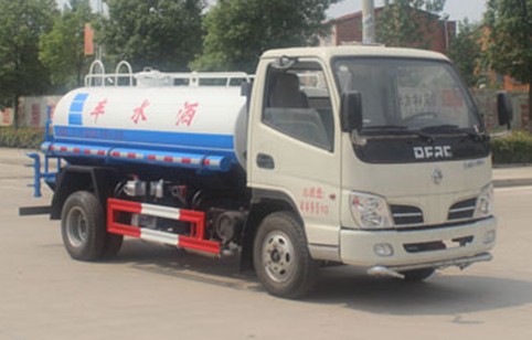 3噸灑水車價格多少_東風(fēng)多利卡2.5噸藍(lán)牌綠化灑水車廠家價格